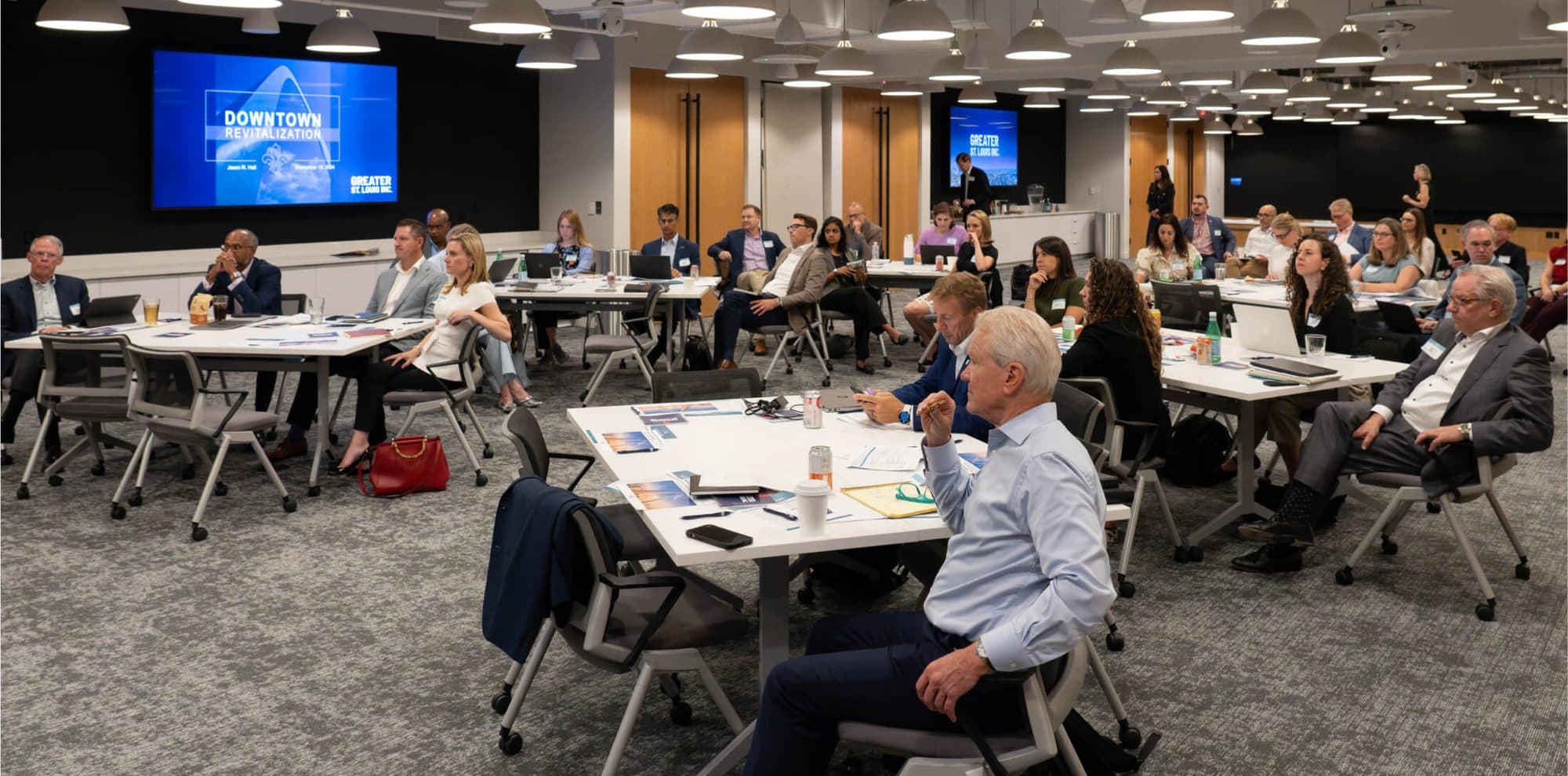 Member leaders working in table groups at an NTC convening