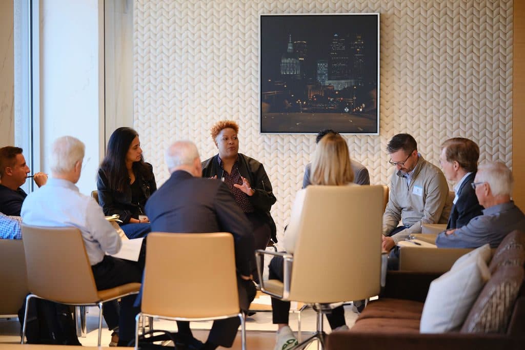 Member leaders in a small-group discussion at the Atlanta convening, 2026