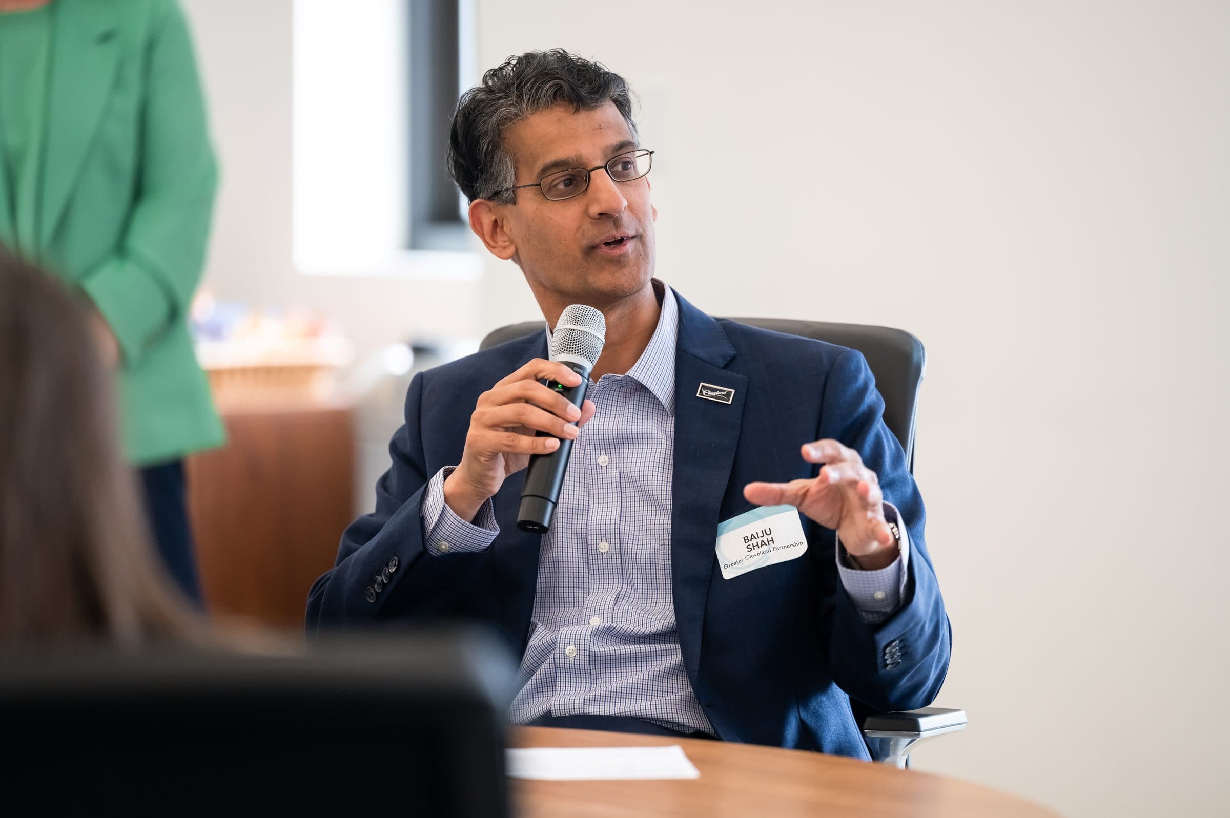 Baiju Shah of Greater Cleveland Partnership speaking at the Cleveland convening, 2025